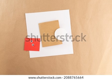materials for Santa Claus art project made of paper and cotton pads for creativity with young and middle-aged children, handmade card for Christmas, DIY, step 1 of instruction