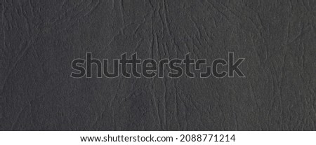 Suitable for background, leather texture surface kraft gray paper close-up, can be used for web templates and artworks