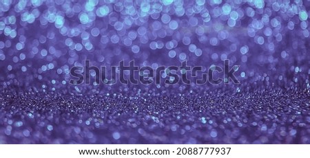 Shiny background with bokeh lights. very peri, Color of the year, 2022, blue, purple, Selective focus. Holiday.