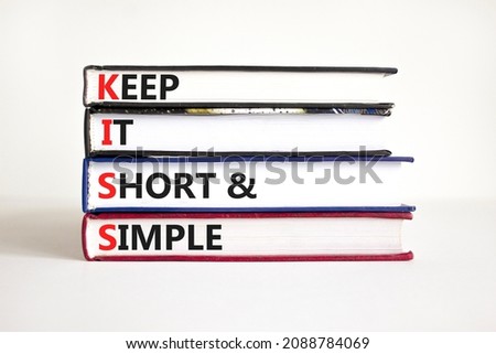 KISS keep it short and simple symbol. Concept words KISS keep it short and simple on books. Beautiful white table, white background. Business KISS keep it short and simple concept. Copy space. Royalty-Free Stock Photo #2088784069