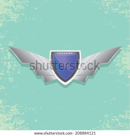 Vector metallic automotive, motorcycle badge with wings. Signs and labels.