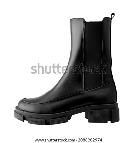 Black leather female boots isolated on white background, copy space