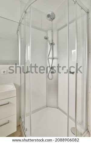 Modern shower stall in a bright bathroom Royalty-Free Stock Photo #2088906082