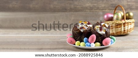 Easter background. Happy easter eggs on nest. Easter eggs. Multi-colored eggs. Easter. Banner. Copy space