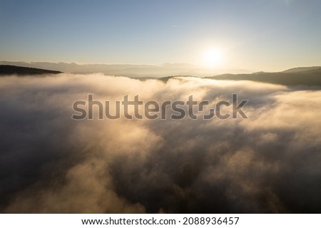 Aerial photography over the clouds in the mountains