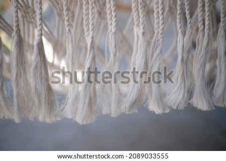 The rope is woven into a beautiful hammock.