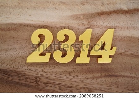 Golden Arabic numerals 2314 on a dark brown to white wood grain background.