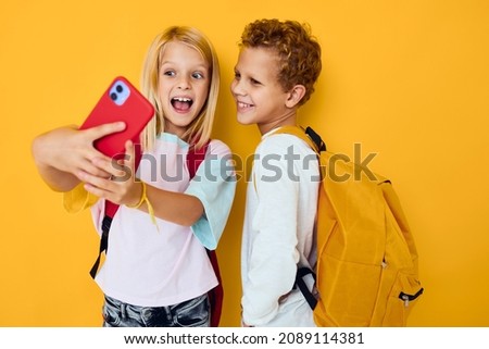 cute kids looking at the phone entertainment communication isolated background