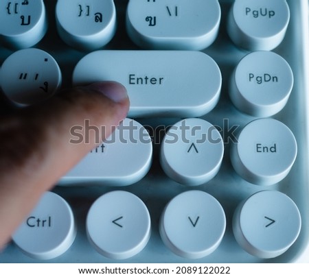 Press the Enter key on the computer keyboard.