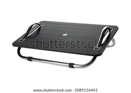 Modern footrest isolated on white background. Closeup view of metal or plastic foot rest. Posture and body care concept Royalty-Free Stock Photo #2089156441
