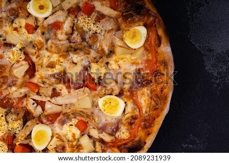 Top view of delicious and crispy pizza. American or Italian pizza. Cooking background concept.