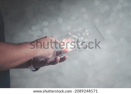 Businessman touching visual icon world map. The concept of futuristic smartphone and connection of world people, abstract image visual