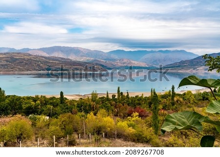 Uzbekistan, beautiful landscape in the northern part at the lake Charvak Royalty-Free Stock Photo #2089267708