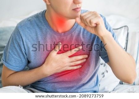 Sore throat and cough, man with lung pain at home, health problems concept Royalty-Free Stock Photo #2089273759