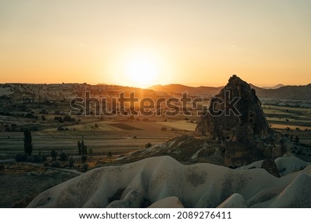 Rose valley Goreme Cappadocia Turkey at sunset. High quality photo