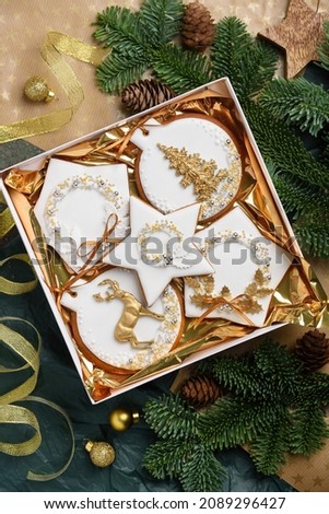 Set of painted festive gingerbread cookies in a box. Christmas concept.   A gift for the New Year. Top view