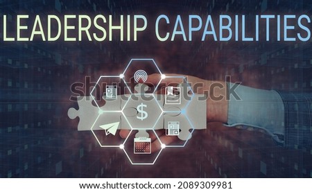Conceptual caption Leadership Capabilities. Conceptual photo Set of Performance Expectations a Leader Competency Hand Holding Jigsaw Puzzle Piece Unlocking New Futuristic Technologies.
