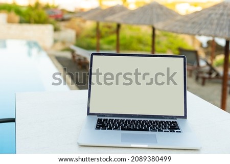 computer on table background as a pool.