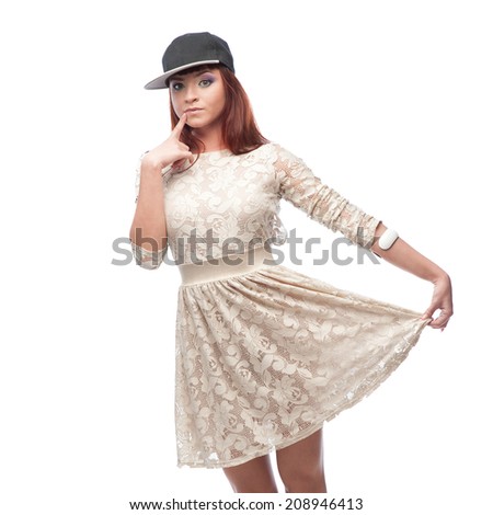 young caucasian red-haired female dancer showing move over white background