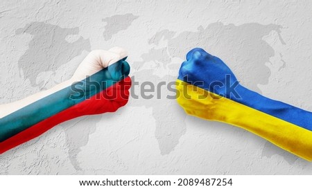 Flags of Ukraine and Russia Flag on hands punch to each others on light gray world map background, Ukraine vs Russia in world war crisis concept Royalty-Free Stock Photo #2089487254