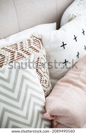 Cushion Pillows Interior Home Design, Coastal Neutral Toned Pillows and Cushions. Detail threes cushion and pillows in bedroom staging design. Home Bedroom Inspiration, coastal toned pillows Royalty-Free Stock Photo #2089490560