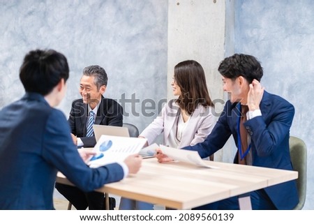 Businesspeople having a discussion in the office