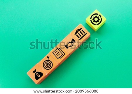 wooden cubes with a business concept. Components of building a successful business company Royalty-Free Stock Photo #2089566088