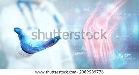 Joint pain, the doctor looks at the hologram of the knee joint. X-ray image, trauma, rheumatologist consultation, skeletal image, medical concept, medical technologies of the future Royalty-Free Stock Photo #2089589776