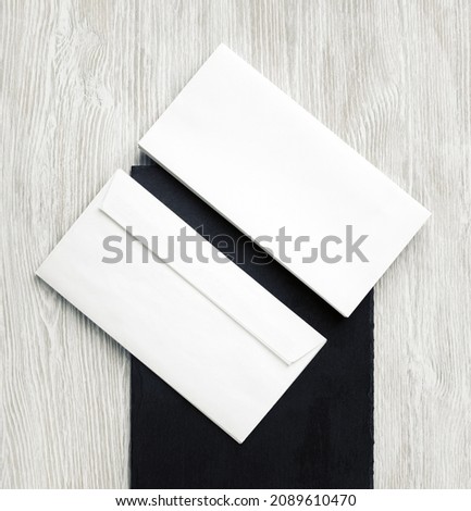 Two blank envelopes. Front and back side. Template for branding identity. Top view. Flat lay.