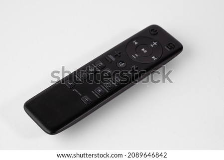 Remote control isolated on white background photo top view, flat lie Royalty-Free Stock Photo #2089646842