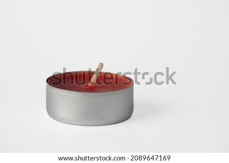 New small wax candle on white background Royalty-Free Stock Photo #2089647169