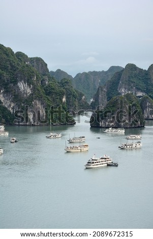 Karst islands and cruises from the top of Ti Top island in Ha Long Bay, Vietnam Royalty-Free Stock Photo #2089672315