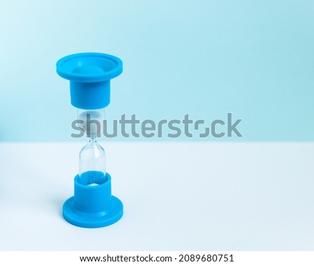 two minute hourglass medical watch on a white-blue background	
 Royalty-Free Stock Photo #2089680751