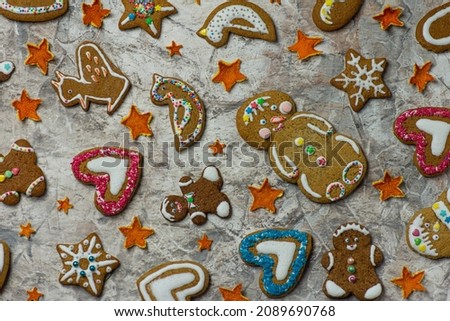 Collection of various gingerbread men. Mixed Christmas cookies. Snowflake, man, candy, heart and star gingerbread.