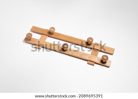 Wooden hanger isolated on white background.High resolution photo.Top view. Mock-up.