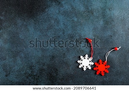 Christmas background. Christmas decorations on dark background. Top view with copy space. New Year flatly. Christmas flatly with decor. New Year composition.