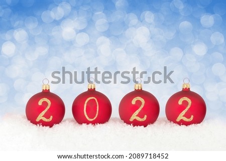 2022 New year text on christmas baubles