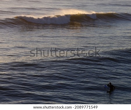 Surfer waiting for the big waves