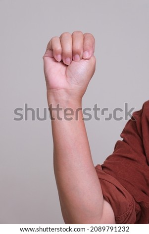 International signal for help created by the Canadian Women’s Foundation: 2. Trap thumb. Royalty-Free Stock Photo #2089791232