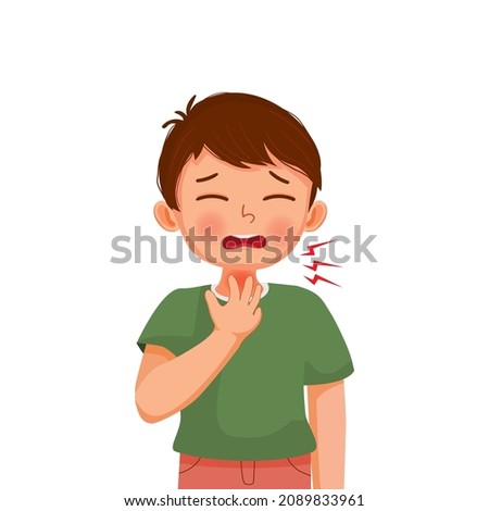Little boy suffering from sore throat touching his painful neck as symptoms of flu and allergy Royalty-Free Stock Photo #2089833961