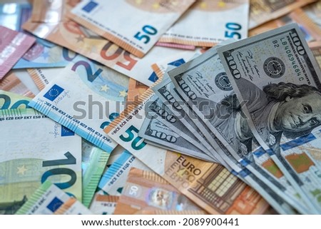us dollar and euro bills as two leading world currencies. business and finance