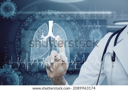 Close up of female doctor pointing at abstract glowing lung interface with virus outline on blurry background. Medicine, pandemic and healthcare concept. Double exposure Royalty-Free Stock Photo #2089963174