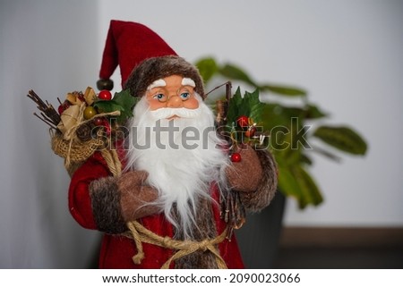 Santa Claus. the figurine representing Santa Claus. Winter holidays. Christmas. Photo inside.
