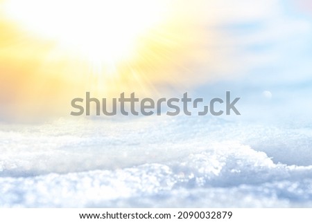 BRIGHT SNOW BACKGROUND WITH SUN SHINE AND CLEAR BLUE SKY, OUTDOOR WINTER BACKDROP