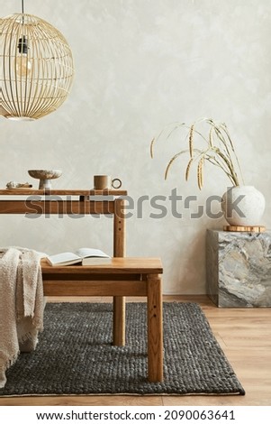 Elegant dining room interior composition with wooden dining table, bench and design home decorations and personal accessories. Modern home staging. Wabi sabi inspiration. Template. 
