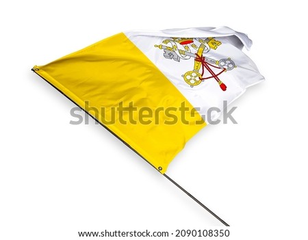 Vatican City's flag is isolated on a white background. flag symbols of Vatican City. close up of a Vatican flag waving in the wind.
