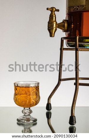 close-up shot glass and decanter bottle reflection drink concept