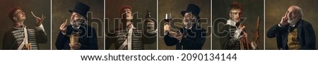 Hussar and aristocrat. Young and old men in image of medieval royalty persons in vintage clothing with drinks and snacks on dark background. Concept of comparison of eras, modernity Royalty-Free Stock Photo #2090134144