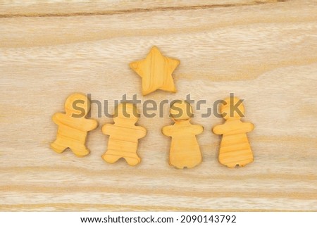 Wooden boy and girl dolls like cookies