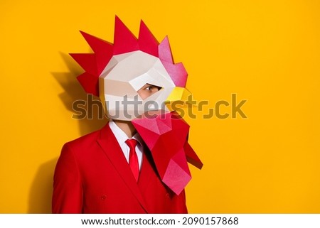 Profile photo of successful anonymous guy wear rooster polygonal mask red suit isolated yellow color background